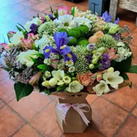 This extra large bouquet comes boxed with a bow our choice of flowers